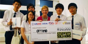 Team Optimo receiving their award from the US Ambassador to Thailand, Kristie Kenney
