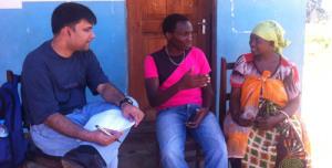 A small-holder farmer in Tanzania takes part in user testing for the new Tigo Kilimo service