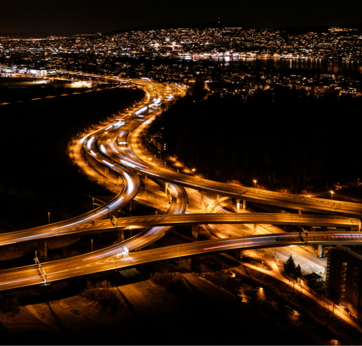 A lighted highway at night