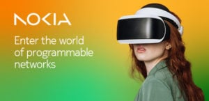 A woman wearing a virtual reality headset is set against a gradient background of yellow, orange, and green. The text reads, "Nokia: Enter the world of programmable networks." She has long red hair and is wearing a green shirt, looking slightly upwards.