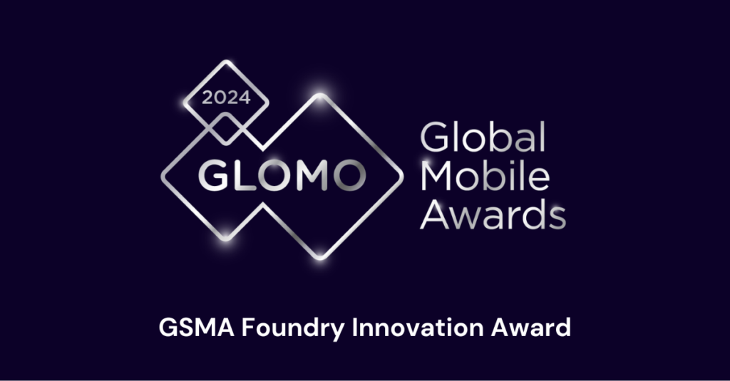 The image shows the 2024 GLOMO Global Mobile Awards logo. It features a geometric design with overlapping squares and the year "2024" at the top. Below is the text "GLOMO Global Mobile Awards." At the bottom, it reads "GSMA Foundry Innovation Award." The background is dark purple.