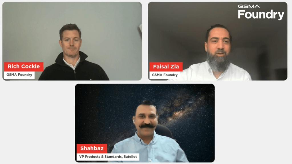 A virtual meeting screenshot shows three men in separate frames: Rich Cockle (top left, wearing a black jacket), Faisal Zia (top right, in a white shirt), and Shahbaz (bottom, with a mustache, wearing a dark shirt and seated before a starry sky background). “GSMA Foundry” is visible top right.