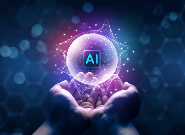 Hands holding a glowing digital sphere with "AI" in the center, symbolizing artificial intelligence technology.