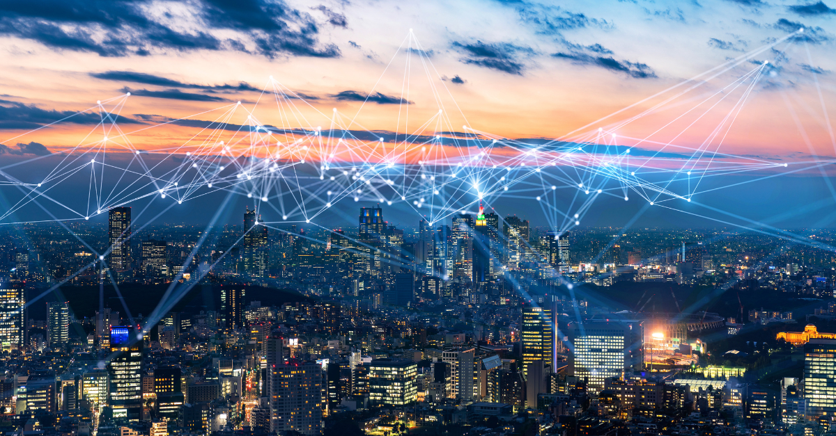 The city of Tokyo at dusk with a network of lines over it, symbolizing its GSMA membership.