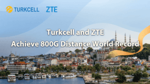 Turkcell and zte celebrate setting a new 800g distance world record, with a picturesque coastal cityscape in the background.