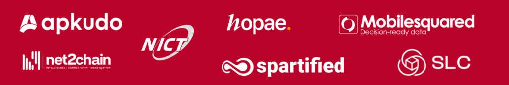 A red background displays seven white logos: apkudo, 1hapae., Mobilesquared, net2chain, NICT, spartified, and SLC, each with unique icons or designs beside their names. All text and icons are in white.