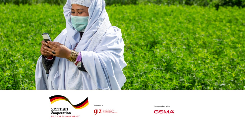 Image of female farmer using mobile phone and logos of GIZ and BMZ