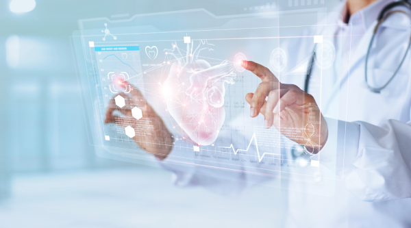 A doctor in a white coat uses a transparent digital screen displaying a 3D heart, medical icons, and heart rate data, representing modern technology in healthcare and cardiology. The scene is bright and futuristic.