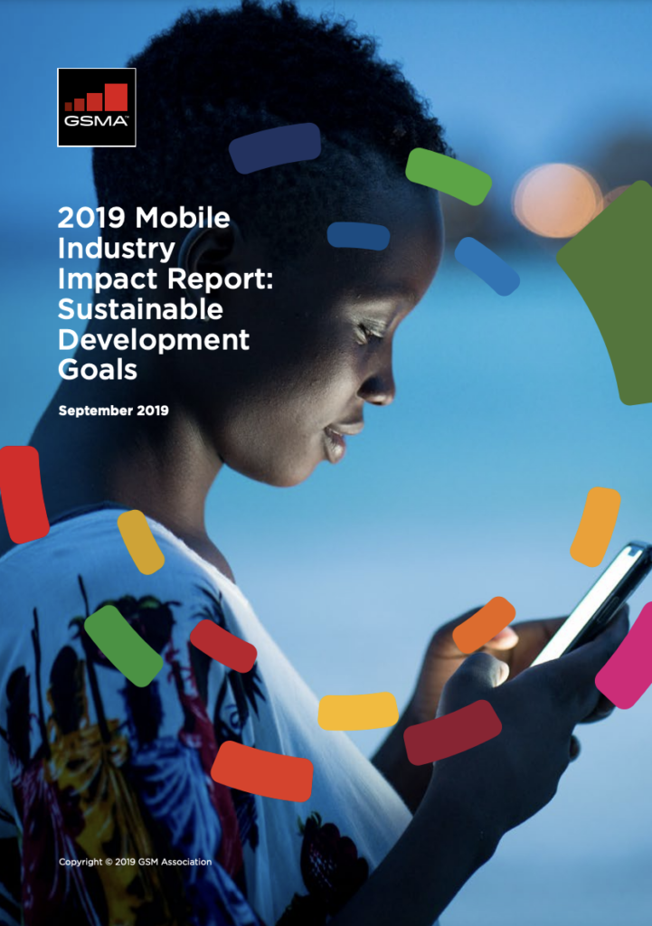 A person is looking at a smartphone against a blue and white backdrop. The cover of the "2019 Mobile Industry Impact Report: Sustainable Development Goals" by GSMA is overlaid on the image, with colorful circular graphics throughout. Report date is September 2019.