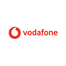 The image features the Vodafone logo. It consists of a red text "vodafone" in lowercase, accompanied by a red circular icon with a white curved line, positioned to the left of the text. The background is plain white.
