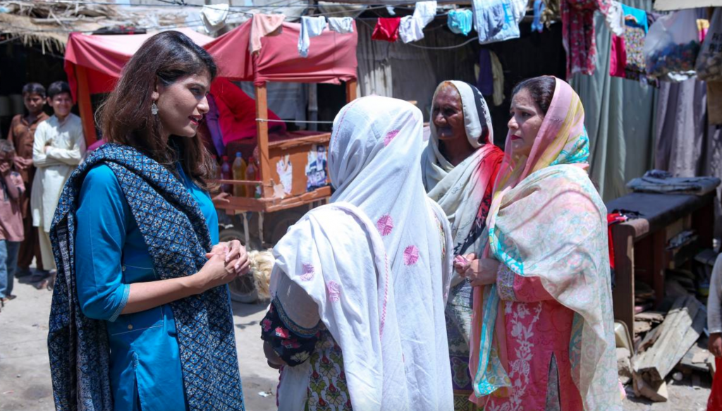 Dr Sara Saeed Khurram talks to patients near a Sehat Kahani telemedicine clinic in Model Colony, on the outskirts of Karachi (Source: Thomson Reuters Foundation/Handout by Sehat Kahani)