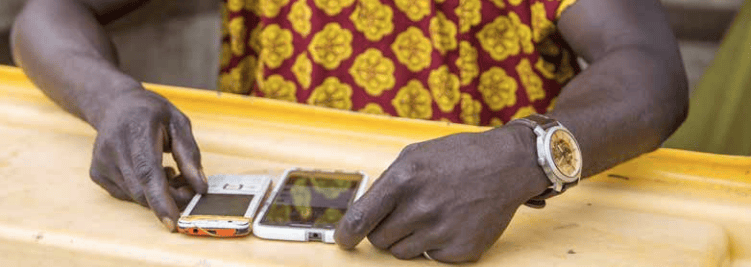 Is mobile money the future of cash and voucher assistance? | Mobile for ...
