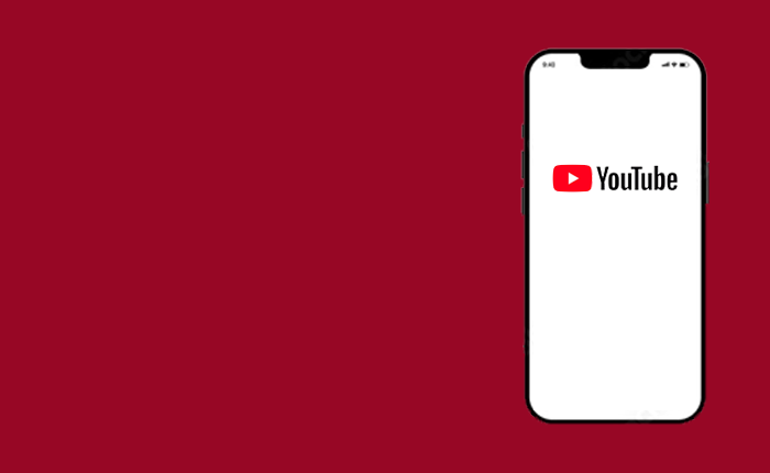 Smartphone displaying the youtube logo on its screen against a red background.