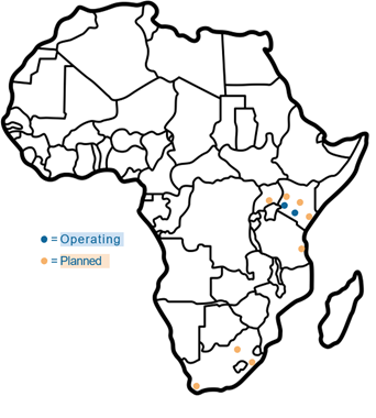 Outline map of Africa showing blue dots labeled "Operating" and orange dots labeled "Planned," mostly in Eastern and Southeastern Africa, indicating locations related to a specific activity, likely infrastructure or facilities. No other features are depicted.