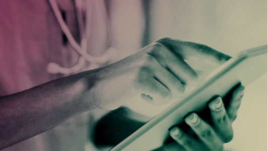 An anticipatory person using a tablet device, tapping on the screen with one finger, ready to engage with new content.