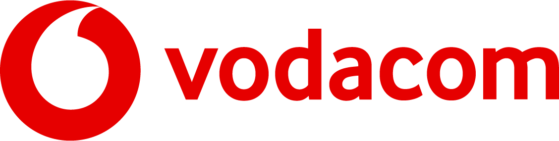 Vodacom logo with a bold red lowercase “vodacom” next to a red circle containing a white curved shape resembling an inverted comma or speech bubble, all on a white background.