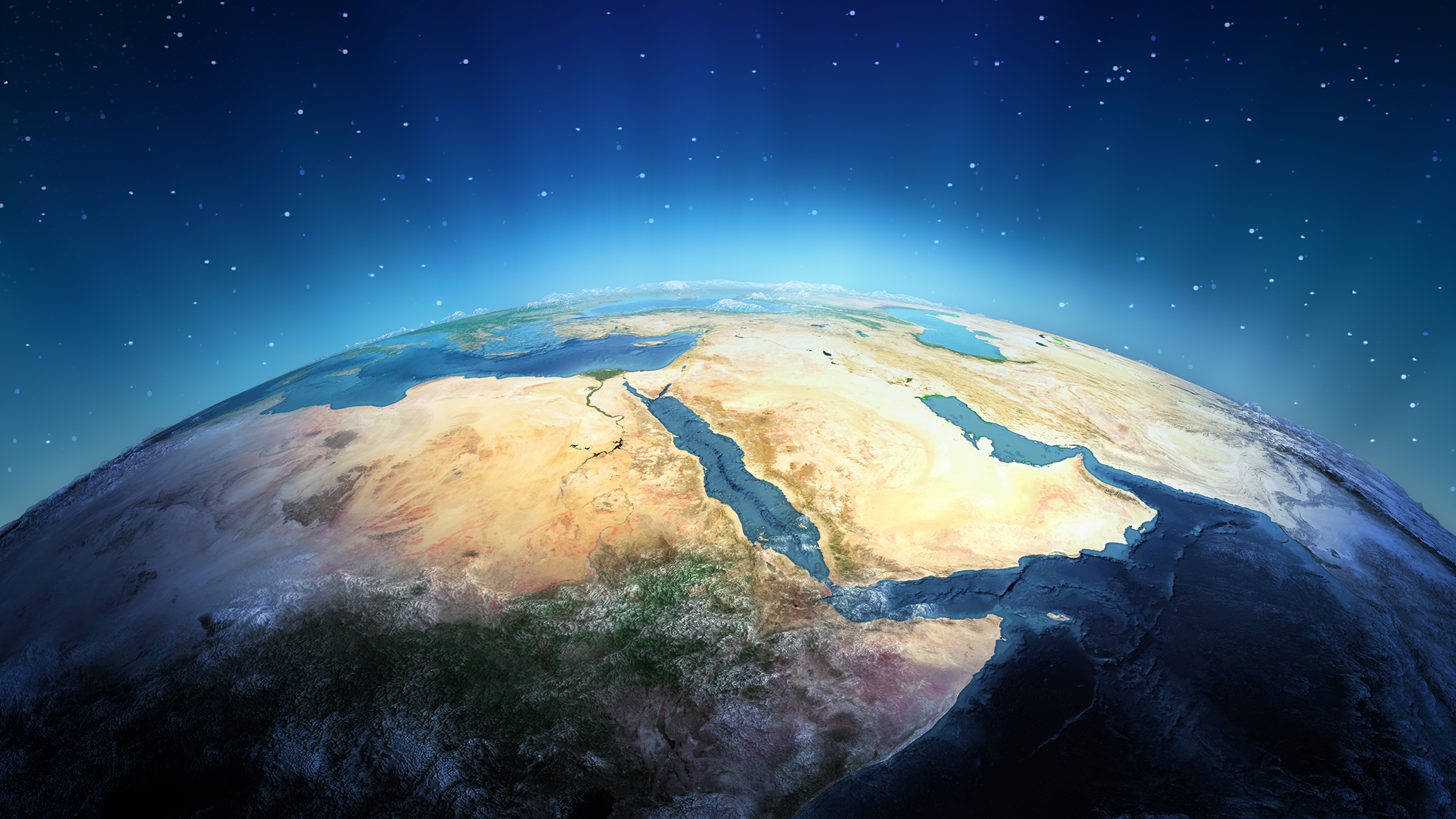 A view of Earth from space highlights the Middle East and northeastern Africa, where GSMA Public Policy influences connectivity. The image reveals the Red Sea, Arabian Peninsula, Nile River, and continents, partially illuminated against a starry backdrop with rays of light streaming from the horizon.