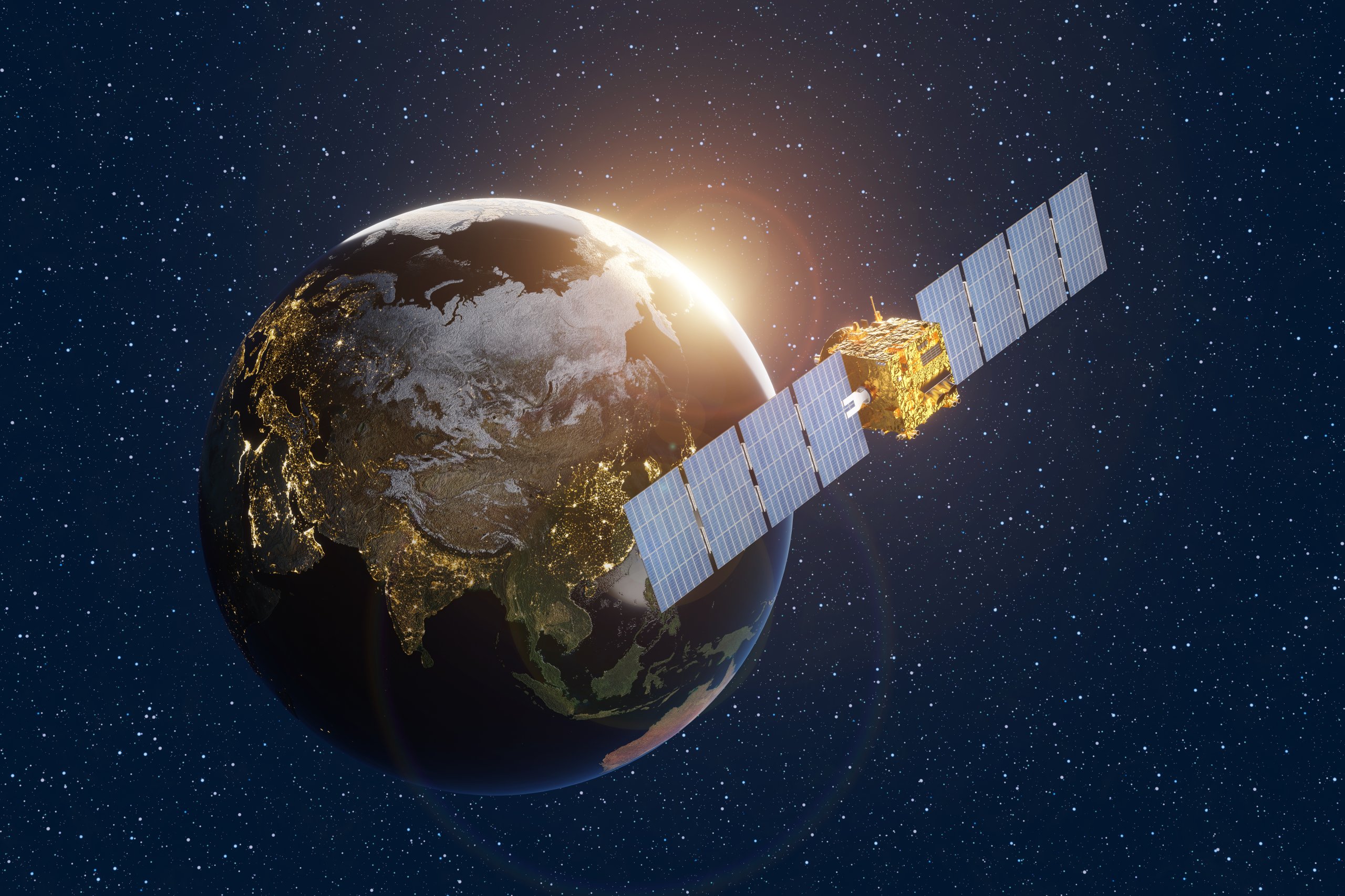 A satellite with large solar panels orbits Earth at night, overlooking Asia with city lights visible—an ever-connected region at the forefront of the mobile industry public policy landscape. The Sun rises behind the planet, casting a golden glow, while the background is filled with numerous stars in space.