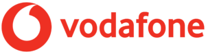 The image displays the Vodafone logo, featuring a bold red wordmark "vodafone" in lowercase letters. To the left, there's a distinctive red circle with a white, curved, teardrop-shaped design inside, representing the brand's iconic speech mark symbol. The background is transparent.