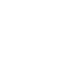White icon of a film strip with a play button in the center, resembling a video or movie symbol, on a black background. The filmstrip has perforated holes on each vertical side and a triangle pointing right inside a square in the middle.