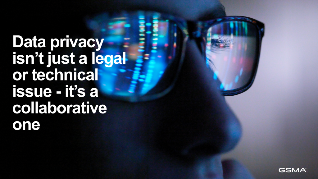 Close-up of a person's face with glasses reflecting colourful data lines, suggesting technology. White text reads: "Data privacy isn’t just a legal or technical issue – it’s a collaborative one." GSMA logo in the bottom right corner.
