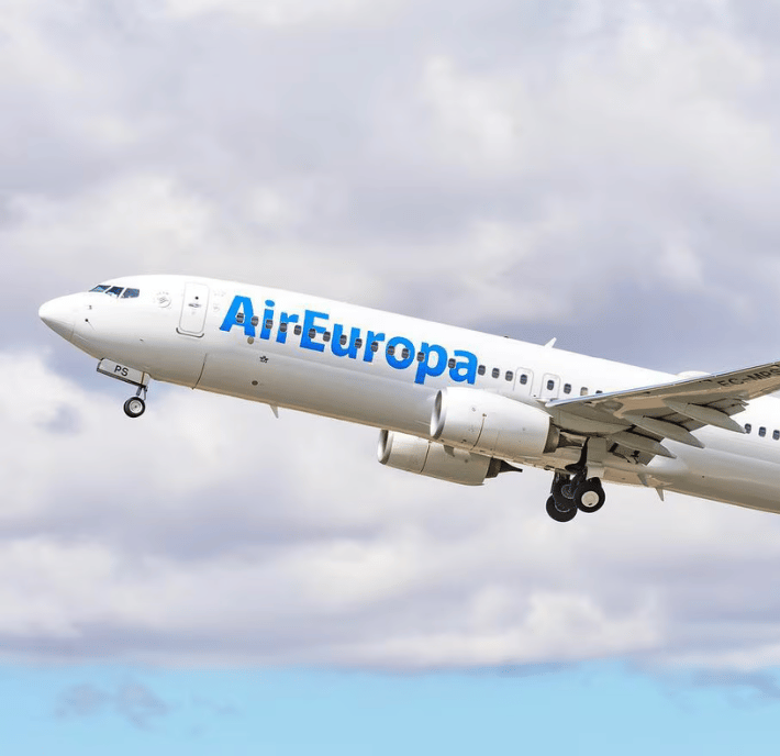 Air Europa airplane taking off against a cloudy sky, viewed from the side—capturing the excitement of flight and meeting every statement of requirements for performance and safety.