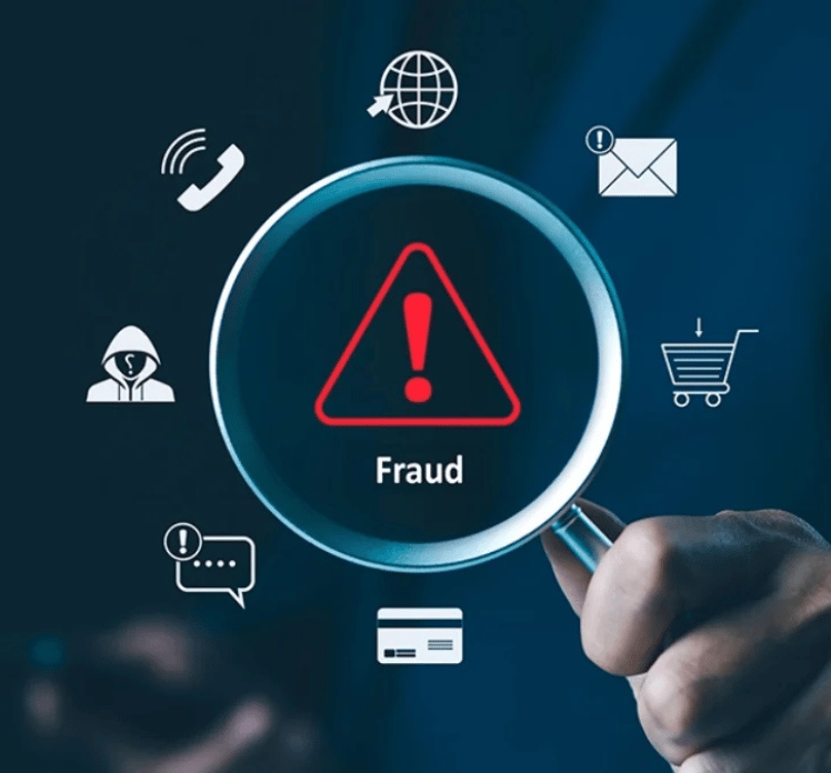 A hand holds a magnifying glass over a red warning triangle with an exclamation mark and the word "Fraud." Surrounding icons depict a credit card, chat bubble, hacker, phone, globe, email alert, and shopping cart, symbolizing various types of online fraud.