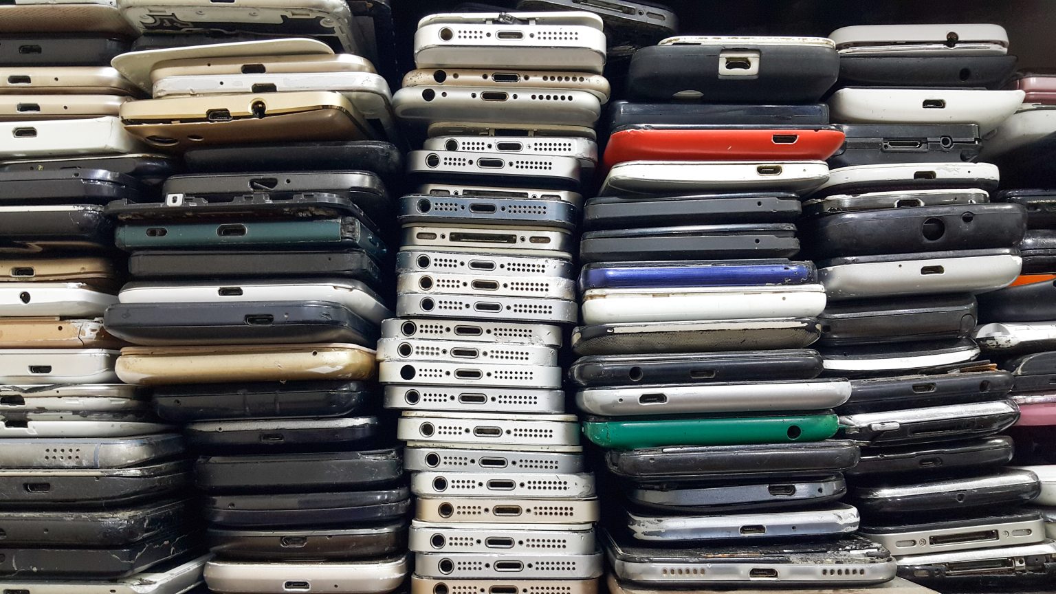 Phones piled up at a marketplace