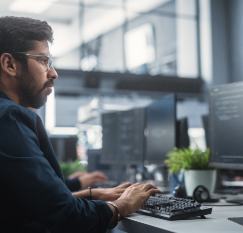 man looking at computer