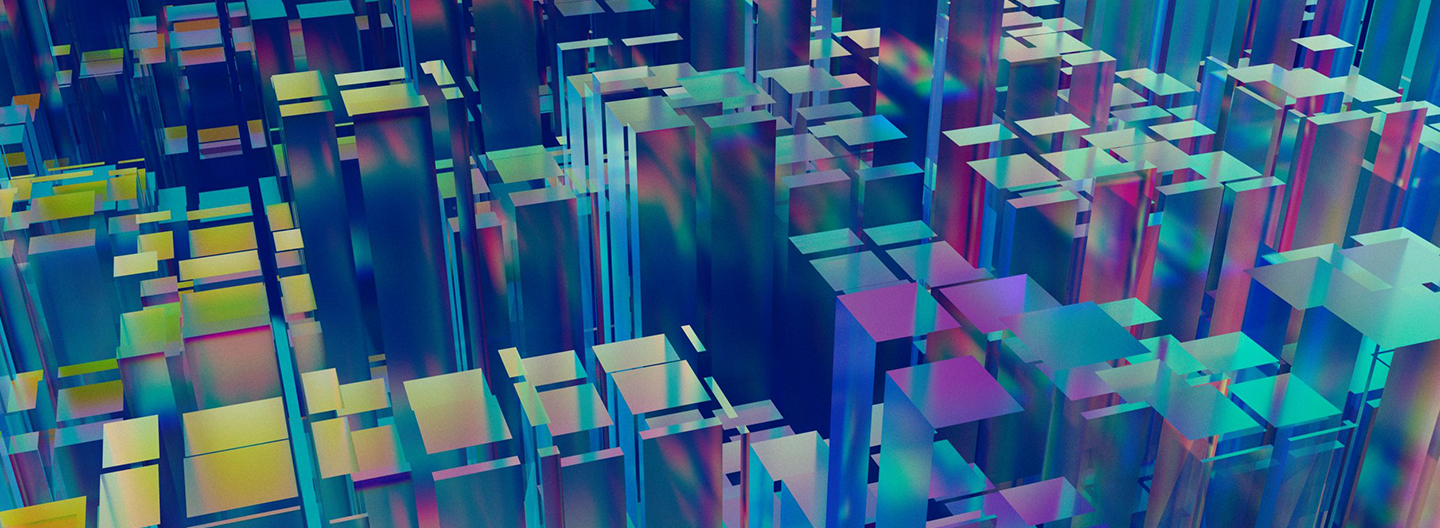 A digital abstract image composed of overlapping and intersecting 3D geometric shapes in various shades of blue, purple, and green, creating a vibrant and complex cityscape-like pattern.