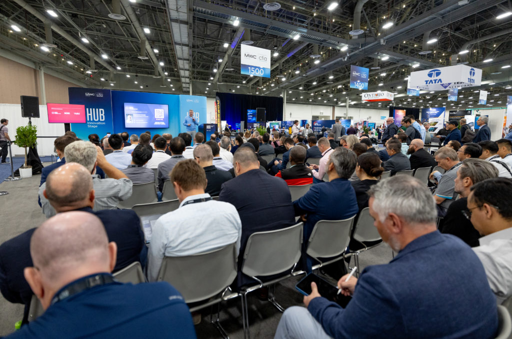 The audience and speaker on stage