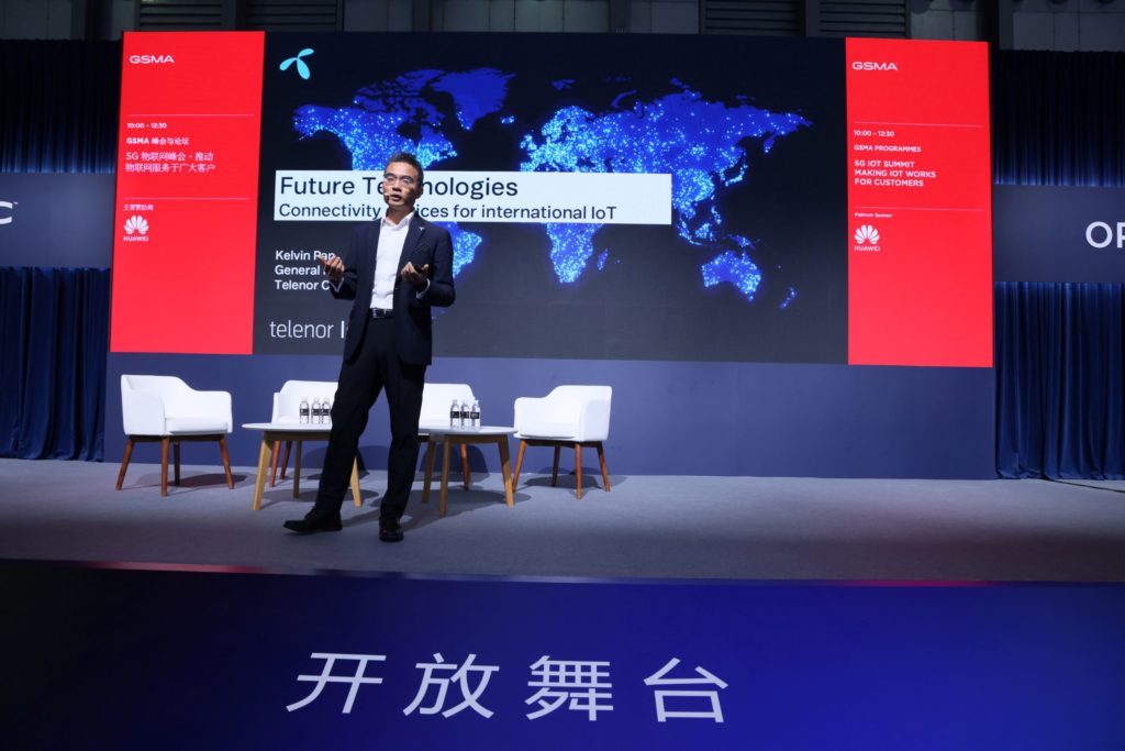 A man standing on stage talking