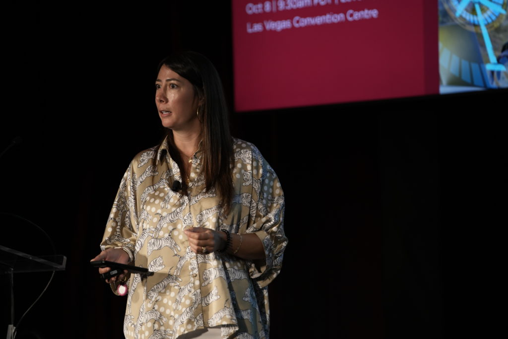 A woman on stage speaking
