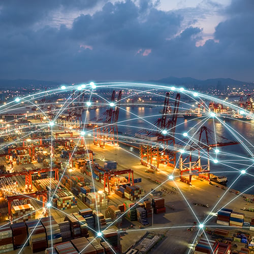 Aerial view of a busy port with glowing lpwan network lines connecting the shipping containers and cranes.