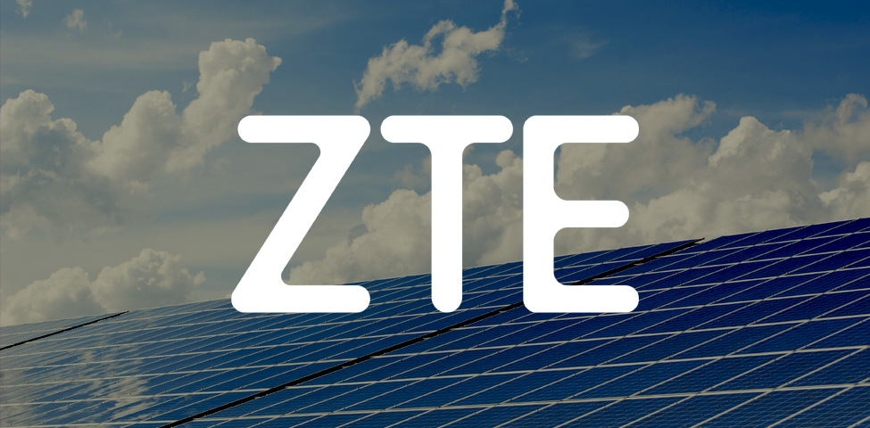 The image shows the bold white text "ZTE" centered over a background of solar panels. Above the panels, a blue sky with white clouds is visible, suggesting a theme of clean energy or solar technology.
