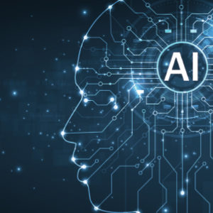 A digital illustration of a human head profile on a dark blue background, composed of interconnected circuits and glowing nodes. The letters "AI" are prominently displayed within a glowing circle at the center of the head, symbolizing artificial intelligence.