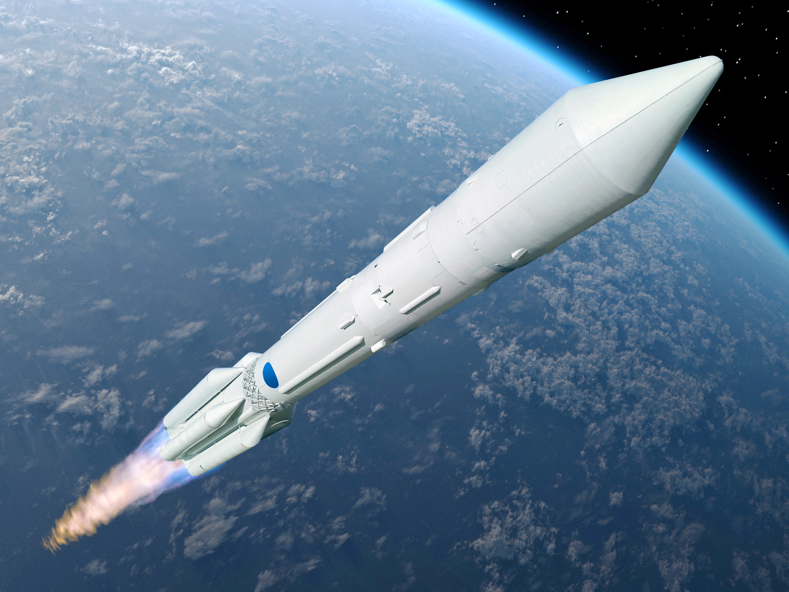 A white rocket launches into space above Earth, with fire and smoke trailing from its engines.
