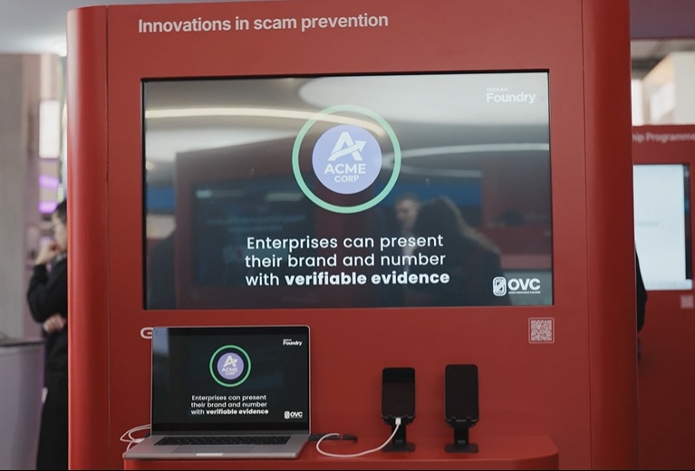 A display stand showcases scam prevention tech with screens reading, "Enterprises can present verifiable evidence.