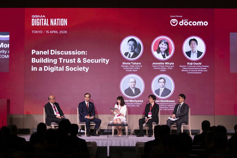 Five panellists sit on stage discussing digital trust and security at the GSMA Digital Nation event in Tokyo.