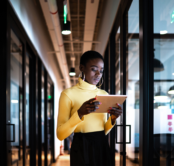 Woman with tablet in office