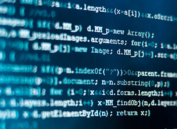 Close-up of a computer screen displaying lines of JavaScript code for a Supply Chain Toolbox. The text shows functions, variables, and method calls on a dark background, with colorful syntax highlighting for enhanced readability.