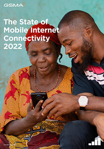 A smiling young man and an older woman sit together, both looking at a smartphone the woman is holding. The man is gesturing towards the screen. The background is teal. Text reads: "The State of Mobile Internet Connectivity 2022.
