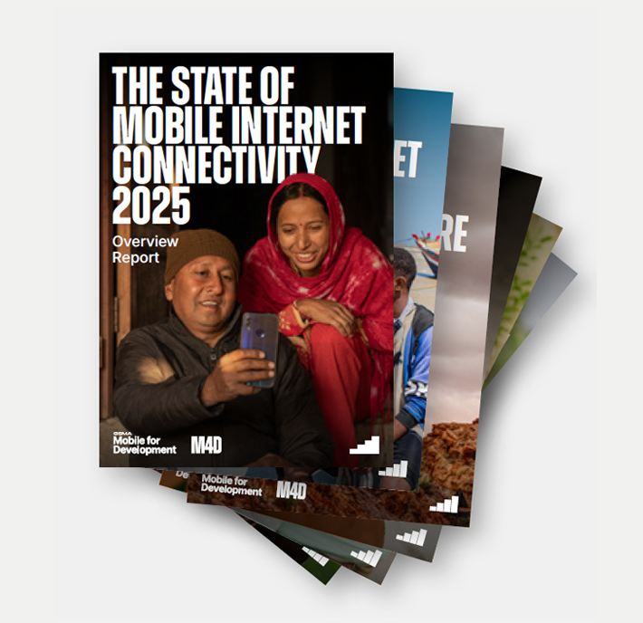 A stack of reports is fanned out, with the top cover titled "The State of Mobile Internet Connectivity 2025 Overview Report." The cover shows two people smiling and looking at a mobile phone. The "Mobile for Development" and "M4D" logos appear at the bottom.
