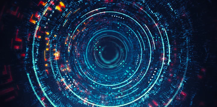 A digital abstract image showing concentric, glowing blue circles with bright red and orange rectangular pixels scattered around, creating a sense of depth and motion, as if looking into a vibrant, high-tech tunnel or vortex.