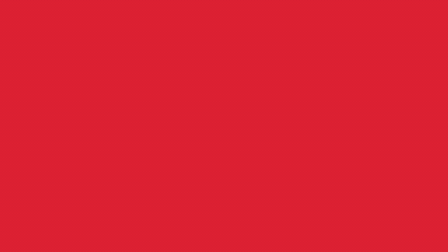 A solid, flat background filled entirely with a vivid red colour. There are no patterns, textures, objects, or text—just a uniform red surface covering the whole image.