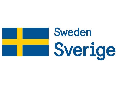 The image shows the Swedish flag—a blue field with a yellow Nordic cross—next to the words “Sweden” and “Sverige” written in blue, with “Sweden” above “Sverige” on a white background.