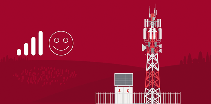 A mobile mast stands on a deep red background next to a signal strength icon and a simple line-art smiley face. The mast is white and red with various aerials attached, situated behind a fenced enclosure containing a solar panel and an electrical box.